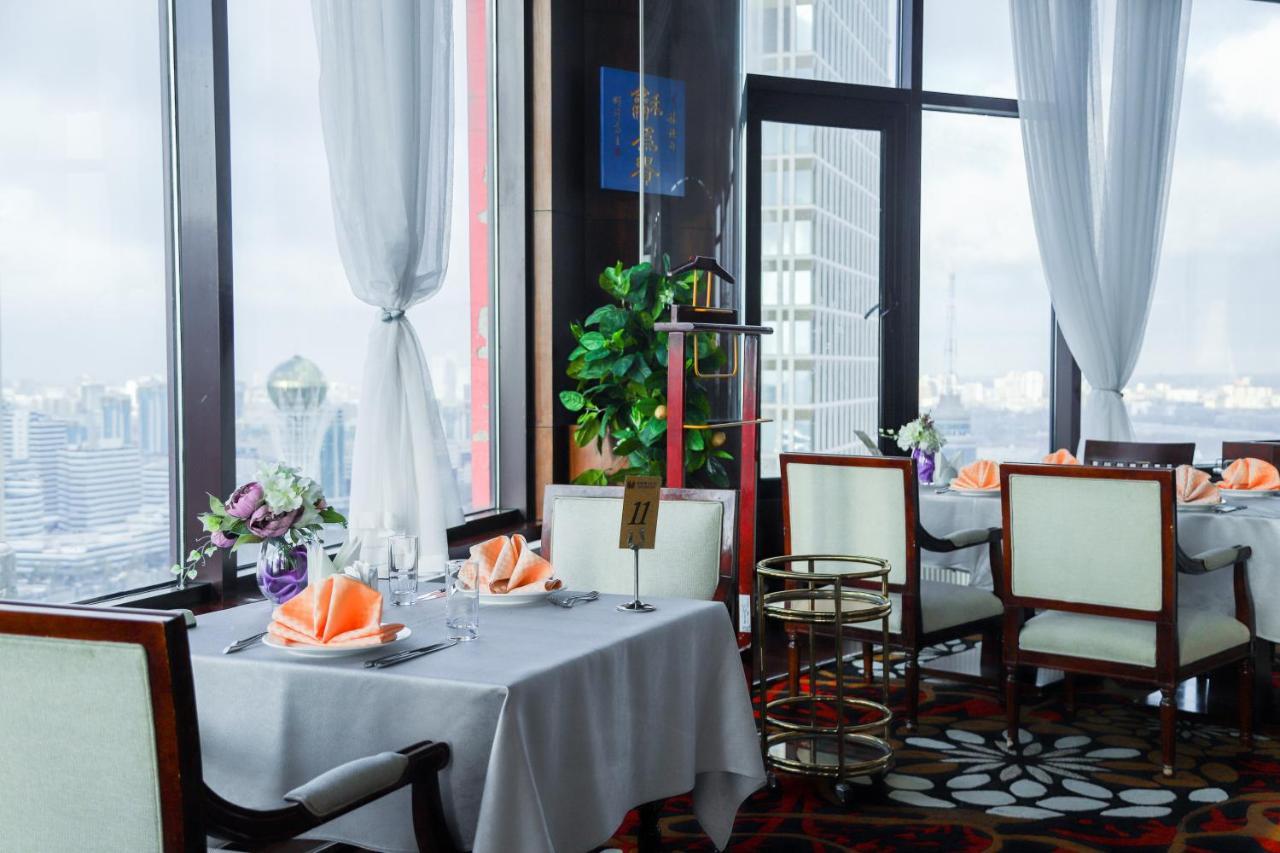Beijing Palace Soluxe Hotel Astana Exterior photo Restaurant