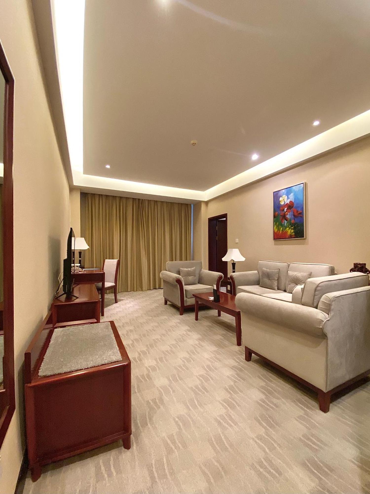 Beijing Palace Soluxe Hotel Astana Exterior photo A living room